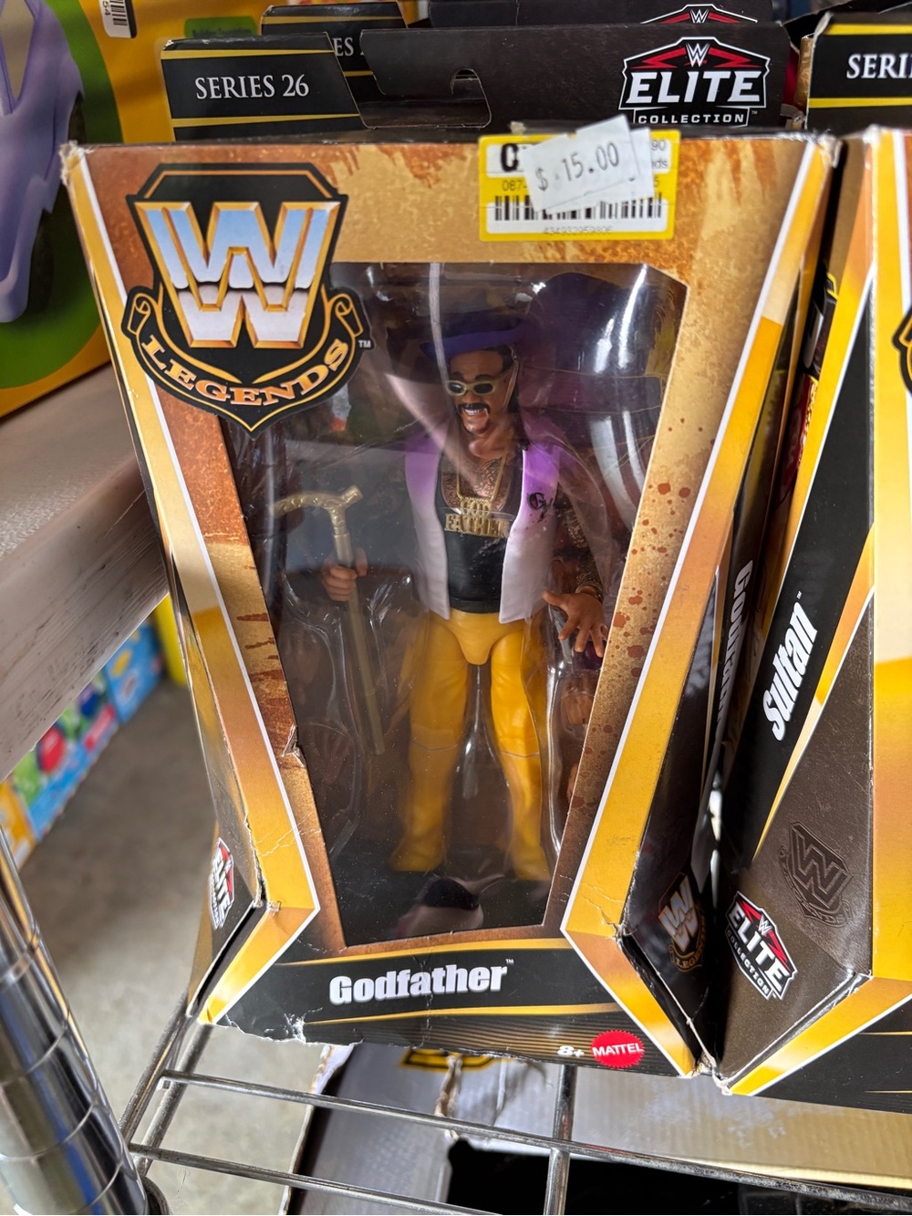 Nwt damaged box WWE Legends The Godfather Action Figure - Yellow & Purple Outfit